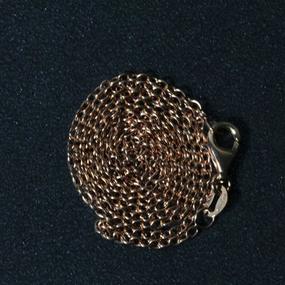 An image displaying 18k Rose Gold Round Oval Link Chain 1.5mm by Orca Market