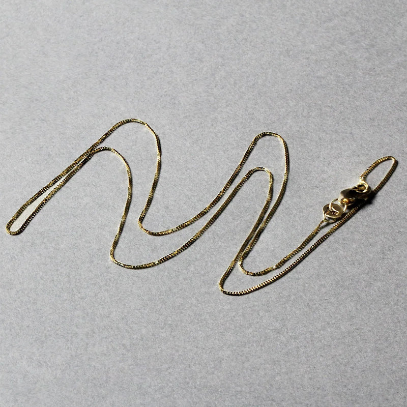 An image displaying 10k Yellow Gold Classic Box Chain 0.45mm by Orca Market