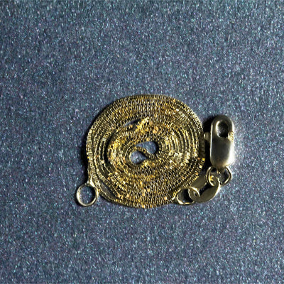 An image displaying 10k Yellow Gold Classic Box Chain 0.45mm by Orca Market