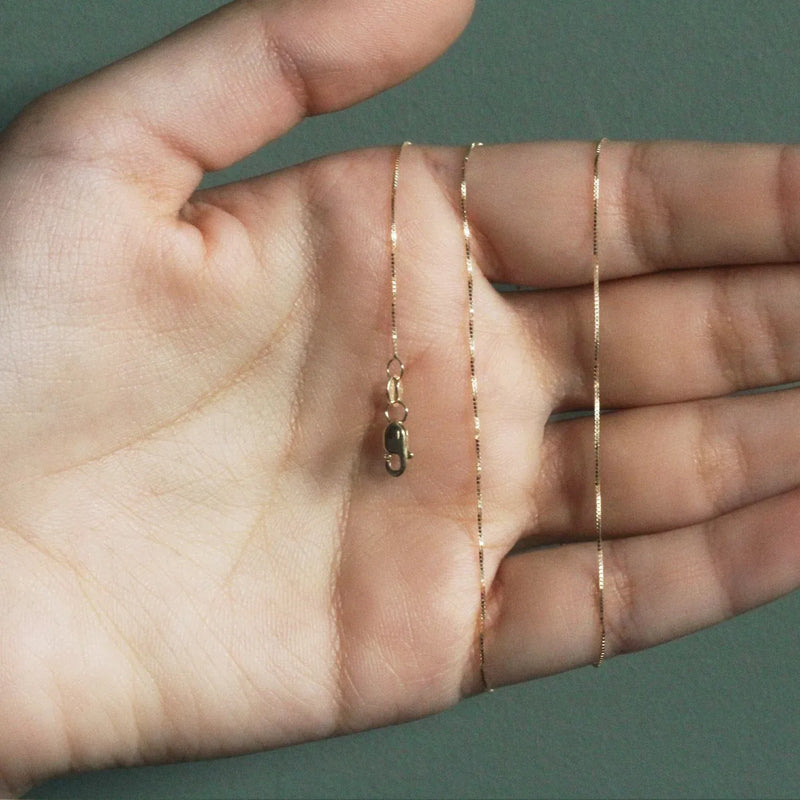 An image displaying 10k Yellow Gold Classic Box Chain 0.45mm by Orca Market