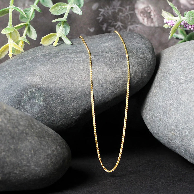 An image displaying 14k Yellow Gold Round Wheat Chain 0.80mm by Orca Market