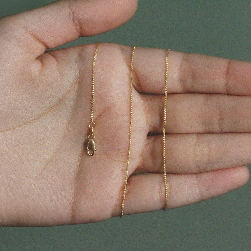 An image displaying 14k Yellow Gold Round Wheat Chain 0.80mm by Orca Market