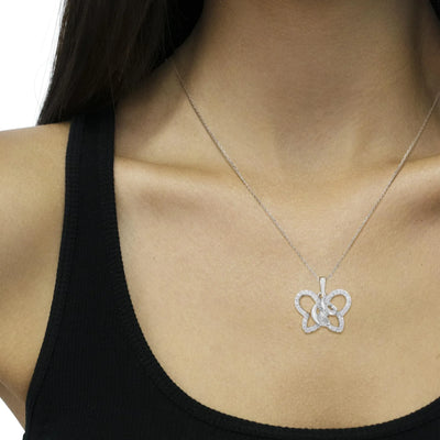 An image displaying .925 Sterling Silver 1/4 cttw Prong-Set Diamond Butterfly 18" Pendant Necklace (H-I Color, I1-I2 Clarity) by Infinite Jewels