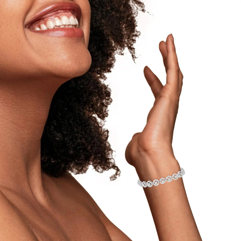 An image displaying .925 Sterling Silver 1/2 Cttw Diamond Nested Circle Miracle Set Open Wheel 7" Fashion Link Bracelet (I-J Color, I3 Clarity) by Infinite Jewels