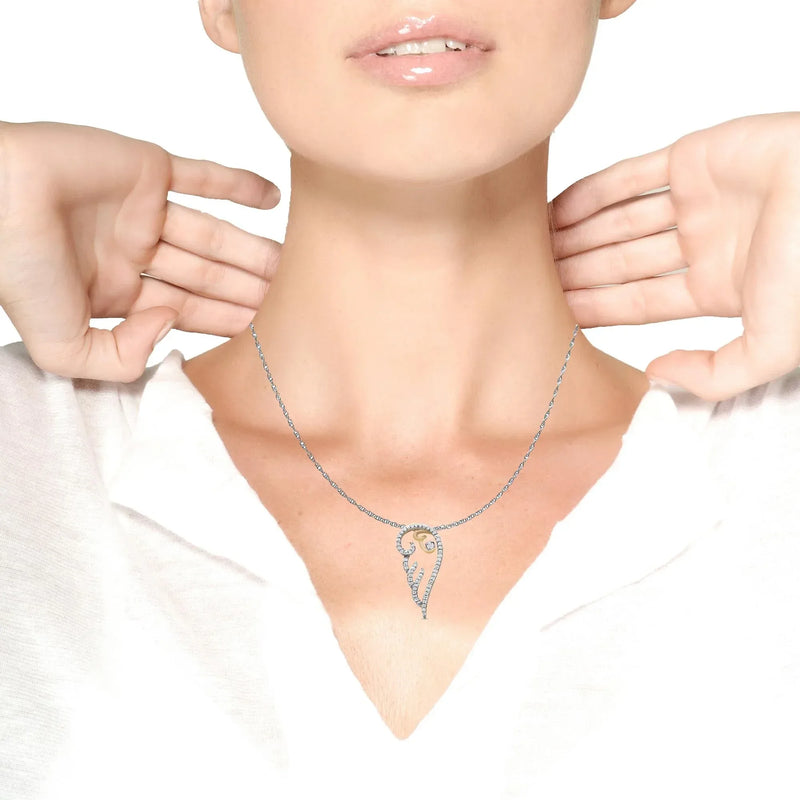 An image displaying 10K Yellow Gold over .925 Sterling Silver 1/4 Cttw Diamond Angel Wing 18" Pendant Necklace (H-I Color, I1-I2 Clarity) by Infinite Jewels