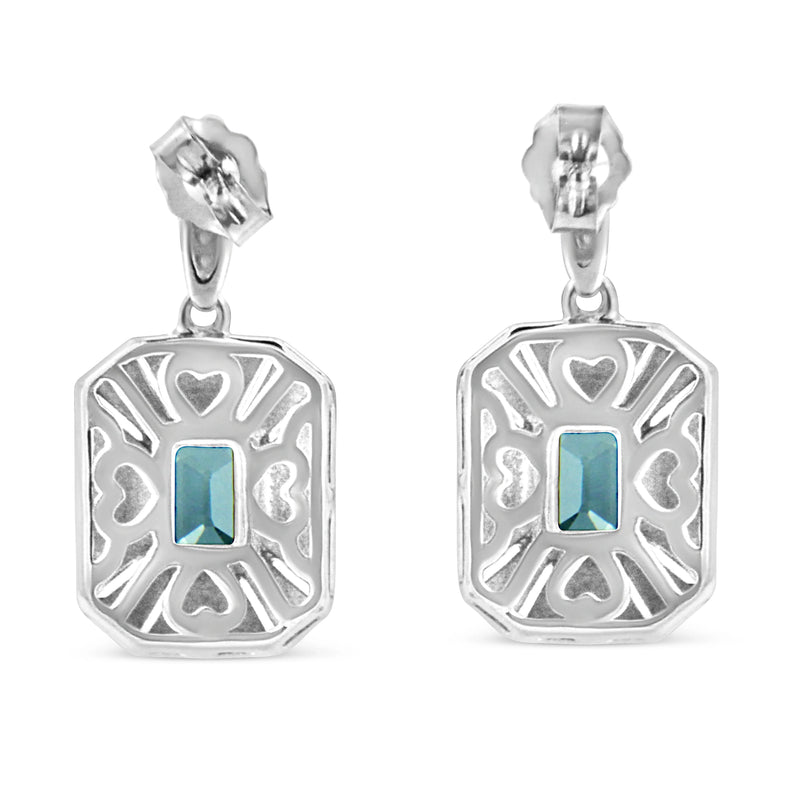 An image displaying .925 Sterling Silver 7x5MM Emerald Shape Blue Topaz and Diamond Accent Art Deco Halo Style Drop and Dangle Earrings (I-J Color, I1-I2 Clarity) by Infinite Jewels
