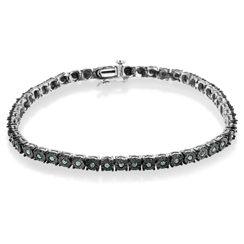 An image displaying Black Rhodium Plated .925 Sterling Silver 1.0 Cttw Diamond Miracle Tennis Bracelet (Enhanced Blue Color, I3 Clarity) - 7" by Infinite Jewels