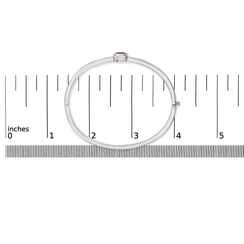 An image displaying .925 Sterling Silver 7X7MM Created Red Ruby Solitaire Bangle Bracelet - 7 Inches by Infinite Jewels