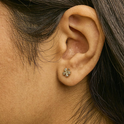 An image displaying 10K Yellow Gold Diamond Accent 4 Leaf Clover Stud Earrings by Infinite Jewels