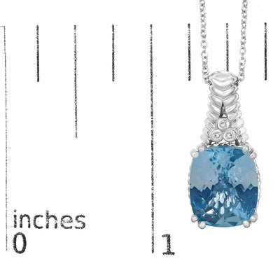 An image displaying .925 Sterling Silver Blue Topaz and Diamond Accent Textured Pendant Necklace - 18" Inches by Infinite Jewels