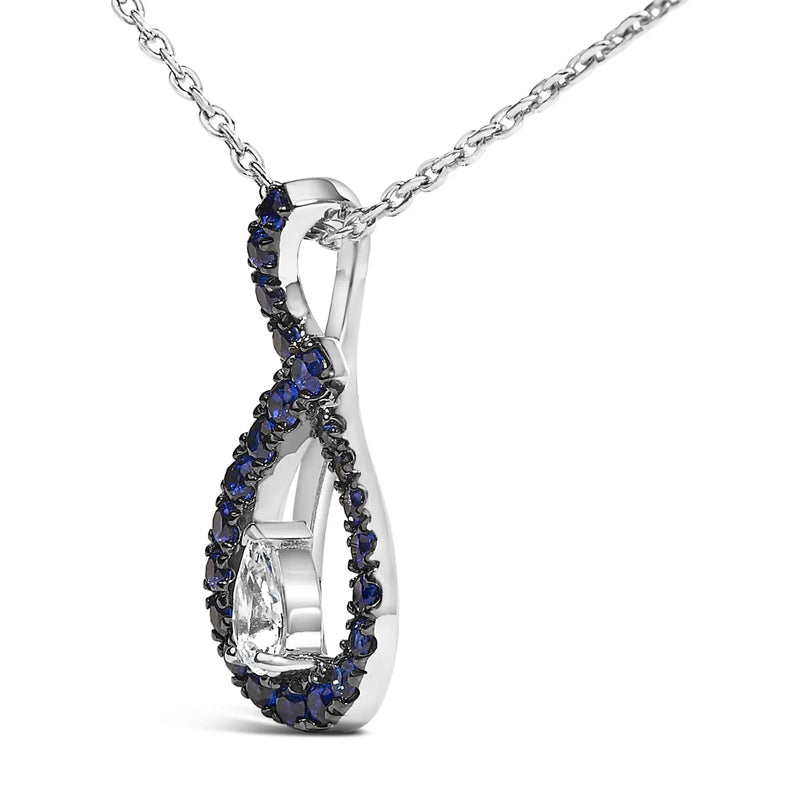 An image displaying .925 Sterling Silver Created Blue and White Sapphire Teardrop Shaped Pendant Necklace - 18" Inches by Infinite Jewels