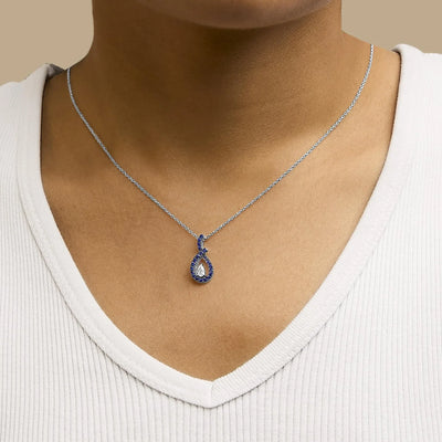 An image displaying .925 Sterling Silver Created Blue and White Sapphire Teardrop Shaped Pendant Necklace - 18" Inches by Infinite Jewels
