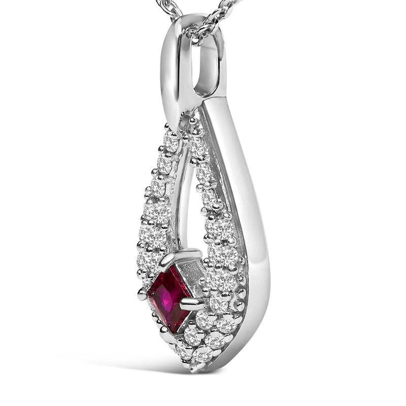 An image displaying .925 Sterling Silver Created Red Ruby and White Sapphire Pear Shaped Pendant Necklace - 18" Inches by Infinite Jewels