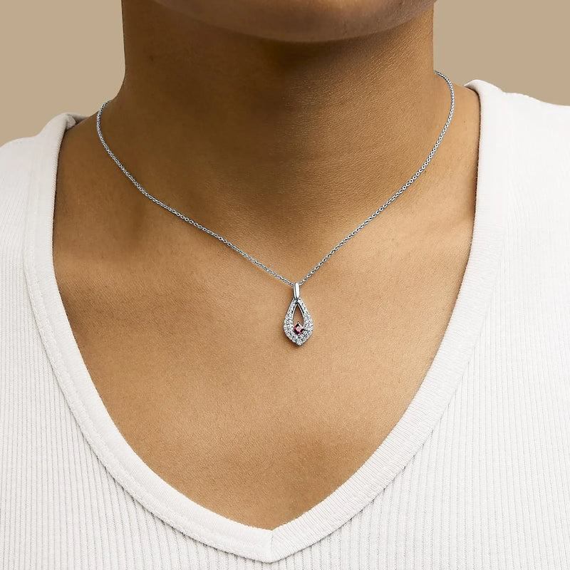 An image displaying .925 Sterling Silver Created Red Ruby and White Sapphire Pear Shaped Pendant Necklace - 18" Inches by Infinite Jewels