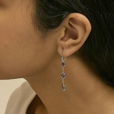 An image displaying .925 Sterling Silver Checkerboard Cut Oval Purple Amethyst 2" Inch Drop and Dangle Earrings by Infinite Jewels