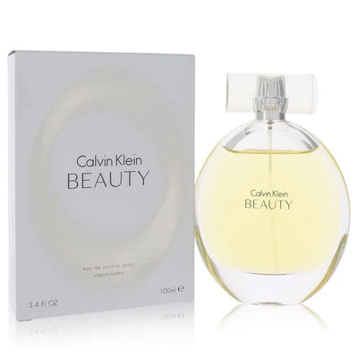 An image displaying Beauty by Calvin Klein Eau De Parfum Spray for Women by Calvin Klein